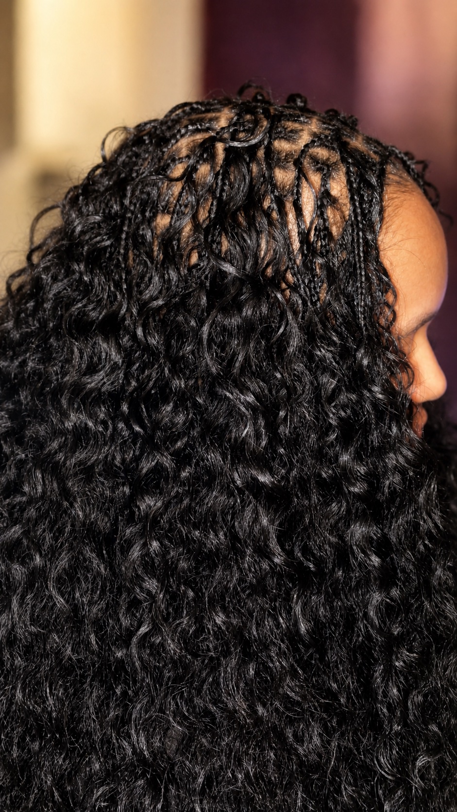 Close detail of a curly braid installation