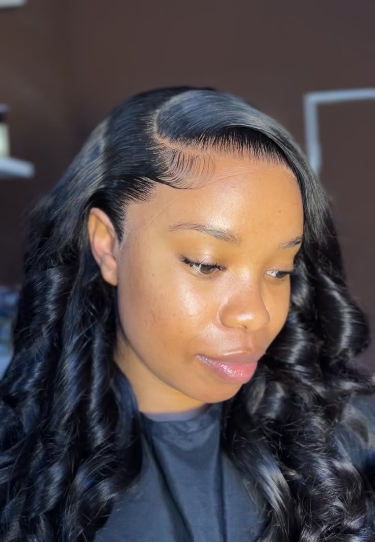 Client showcasing a sleek side-part wig installation
